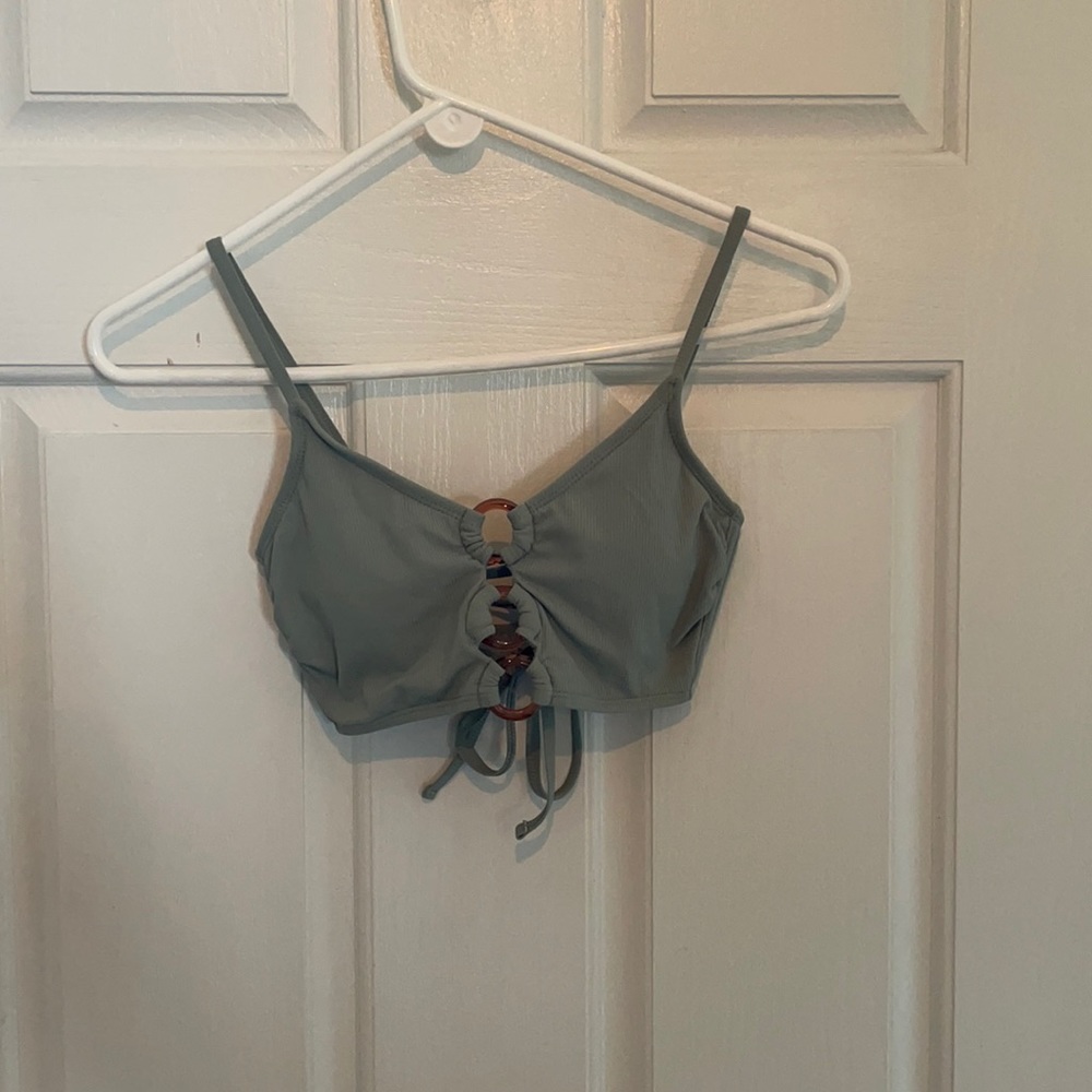 Patel green bathing suit/ crossed back/ hoops